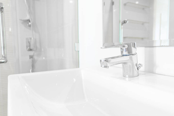 faucet or tap in bathroom interior - Fotoğraf, Görsel