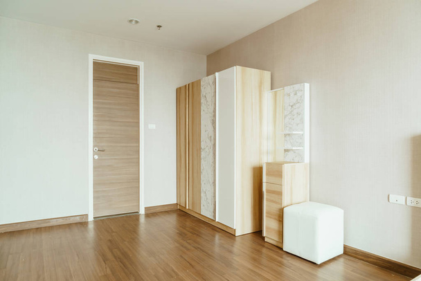 beautiful wooden wardrobe in a room - Фото, зображення