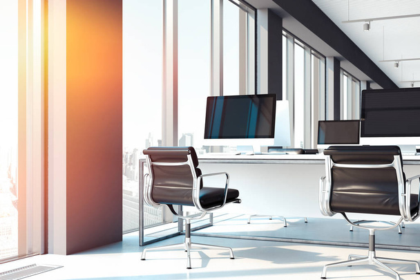 PCs with big blank monitors on tables. open workspace at office. 3d rendering. - Photo, Image