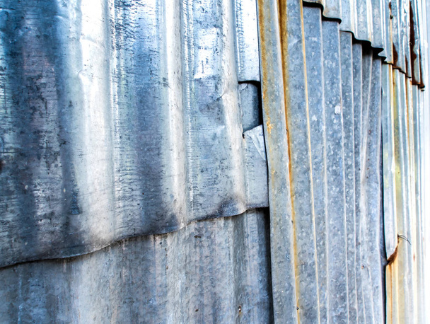 Rusty corrugated galvanized sheet iron fence - Fotó, kép
