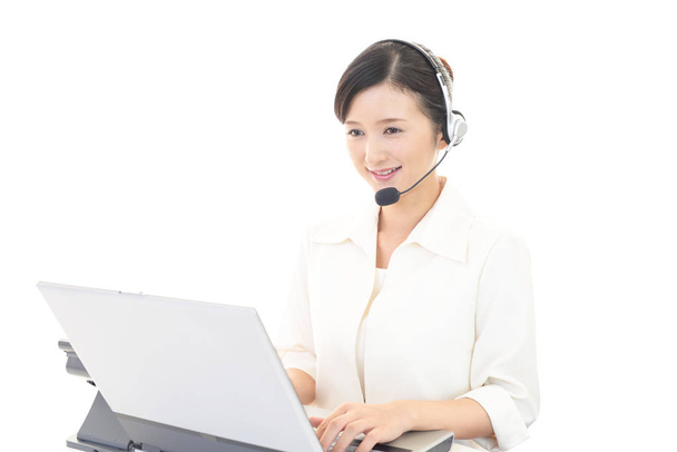 Smiling call center operator - Photo, image