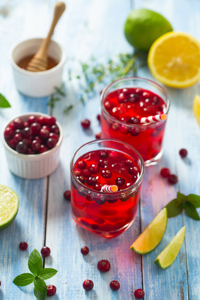 healthy homemade cranberry drink on wooden surface - Photo, image