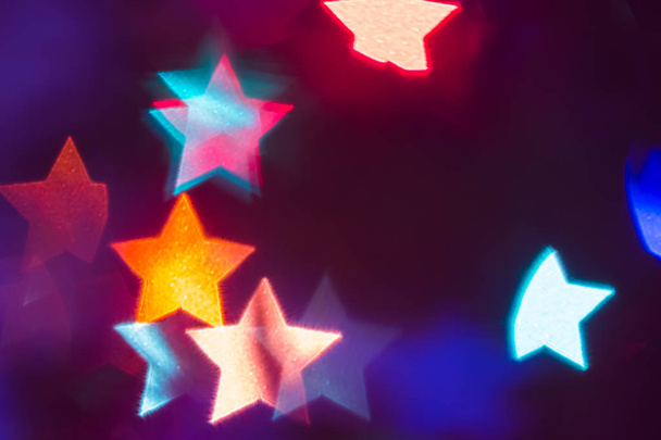 Abstraktní vánoční pozadí s bokeh ve tvaru hvězdy - Fotografie, Obrázek