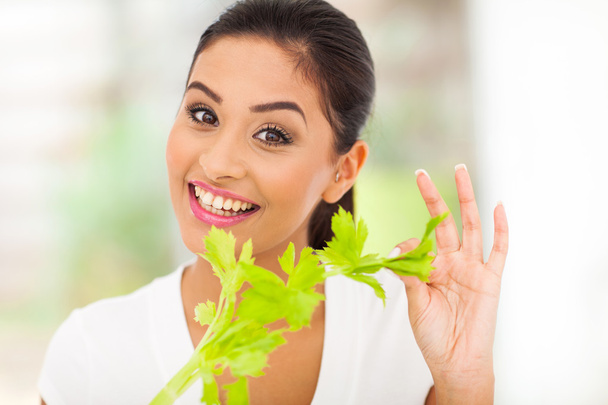 healthy woman holding celery - 写真・画像