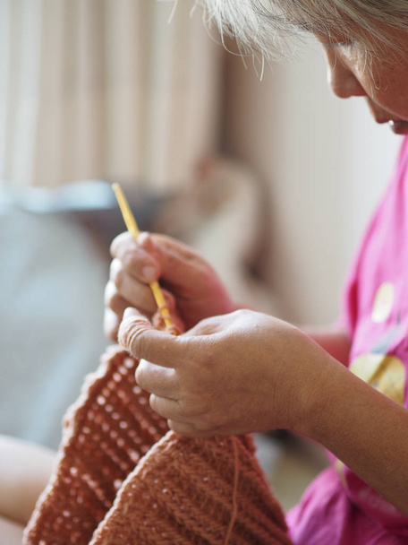 hobby doing crafts Knitting hat  - Fotografie, Obrázek
