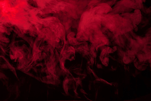 red smoke or steam on black for wallpapers and backgrounds - Zdjęcie, obraz