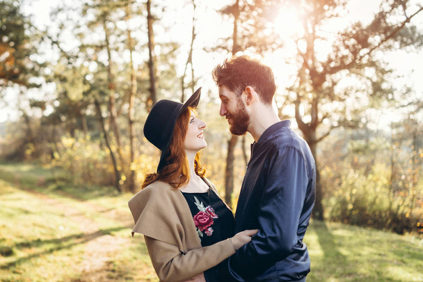 Happy young romantic couple spend time together outdoor - Фото, зображення