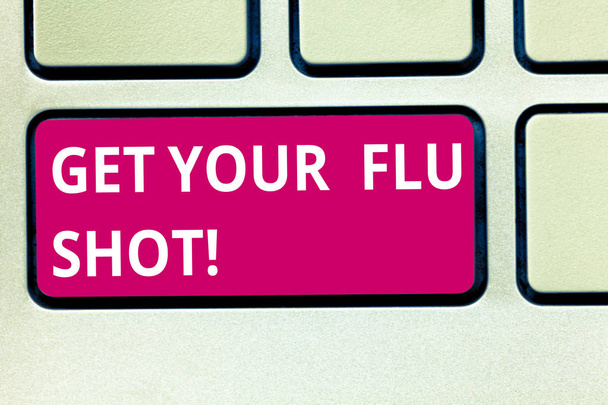Text sign showing Get Your Flu Shot. Conceptual photo Have a vaccination for avoiding being sick immunization Keyboard key Intention to create computer message pressing keypad idea. - Photo, Image