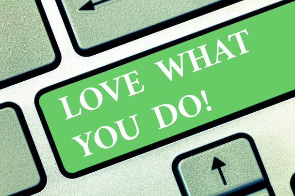 Writing note showing Love What You Do. Business photo showcasing Make things that you like enjoy with positive attitude Keyboard key Intention to create computer message pressing keypad idea. - Photo, Image