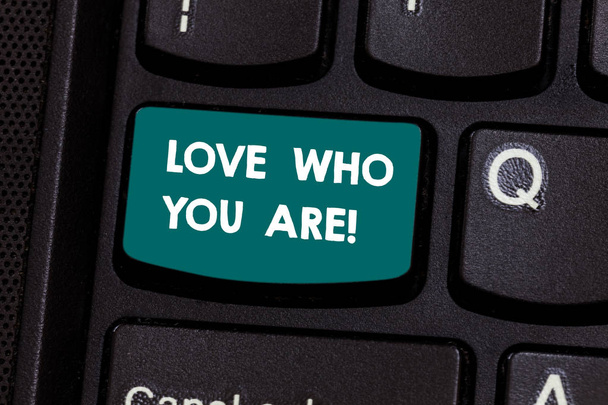 Text sign showing Love Who You Are. Conceptual photo Expressing roanalysistic feelings and positive emotions Keyboard key Intention to create computer message pressing keypad idea. - Photo, Image
