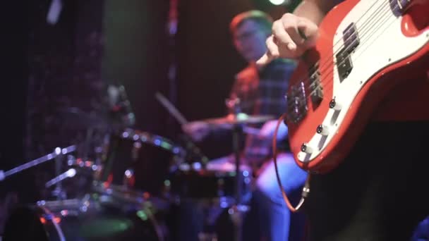 The young rock band performed with a concert at the pub. Rock guitars and drums. - Záběry, video