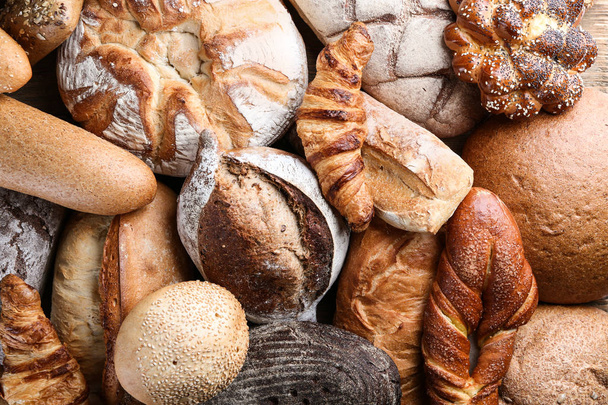Produtos de pão recém-assados como pano de fundo
 - Foto, Imagem