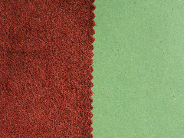 muestra de muestra de muestra de tela marrón con borde en zig zag cortado con tijeras rosadas
 - Foto, imagen
