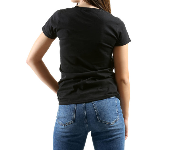 Young woman in stylish t-shirt on white background, back view - Photo, Image
