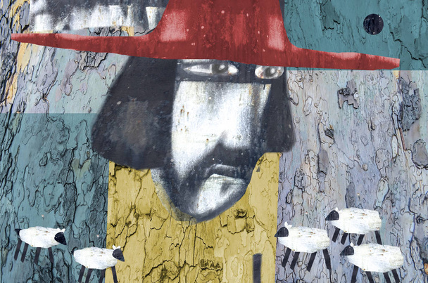 Collage-Kunst mit dem Bild eines Mannes mit rotem Hut. die Technik der Autorenschaft mit unterschiedlichen Texturen. Schäfer und Schafe - Foto, Bild