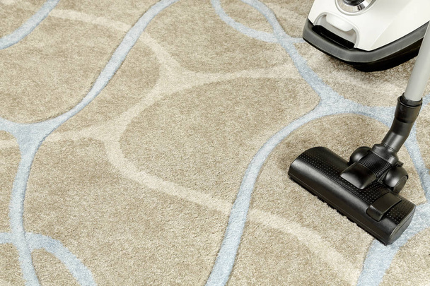 vacuum cleaner on carpet with copy space - Foto, Imagem