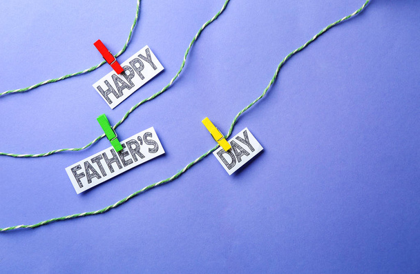 Words HAPPY FATHER'S DAY on color background - Photo, Image