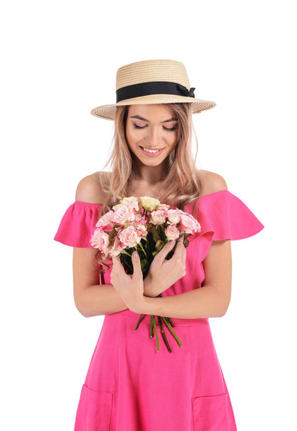 Beautiful young woman with bouquet of flowers on white background - Fotó, kép
