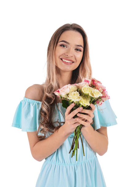 Beautiful young woman with bouquet of flowers on white background - Foto, imagen