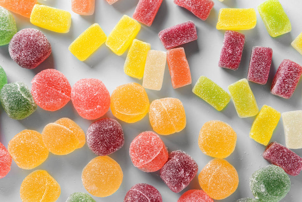 Tasty jelly candies on grey background - Photo, Image