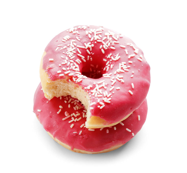 Вкусные пончики на белом фоне
 - Фото, изображение