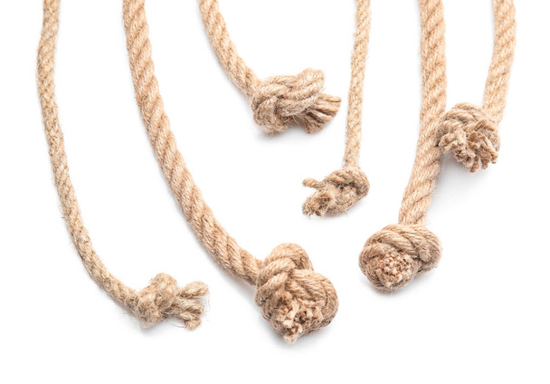 Ropes with knots on white background - Φωτογραφία, εικόνα