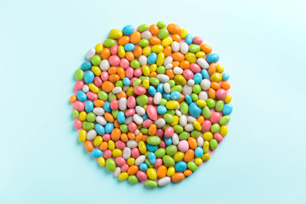 Heap of tasty candies n color background - Фото, зображення