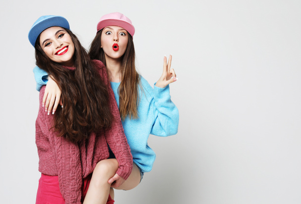  two stylish sexy hipster girls best friends. - 写真・画像
