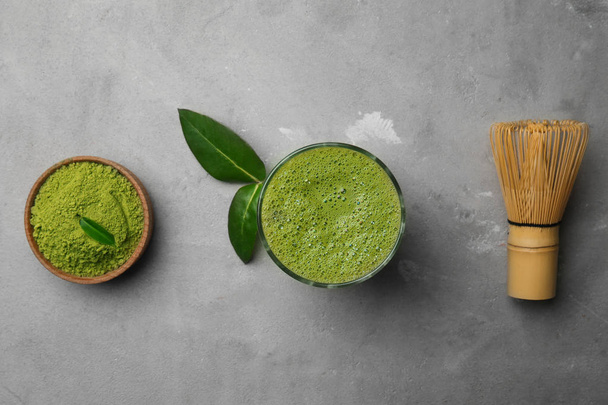 Composition with matcha tea on grey background - Photo, Image