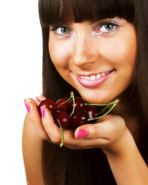 beauty woman with cherries on white close up - Zdjęcie, obraz