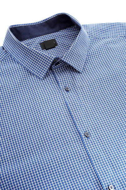 Close up view of blue checkered shirt  - Foto, imagen