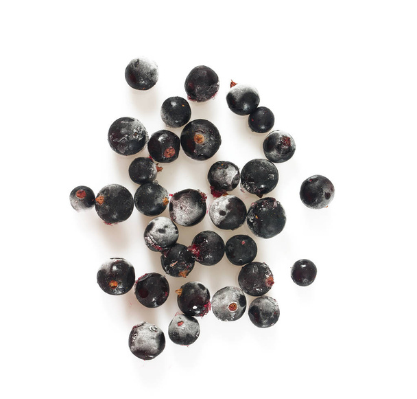 healthy frozen blackcurrants isolated on white background - Foto, imagen