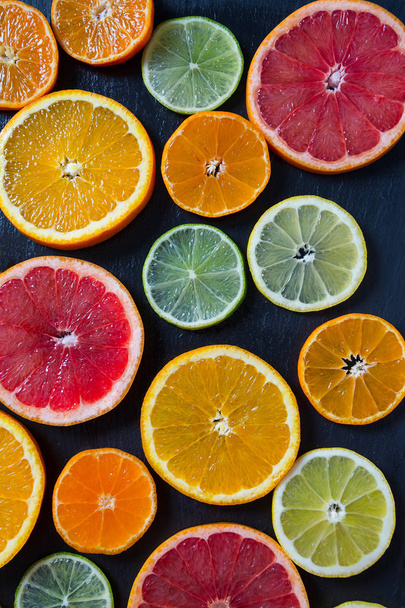 slices of fresh ripe juicy citrus fruits - Фото, зображення