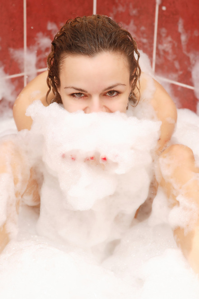 Young woman enjoys bath-foam - Foto, Bild