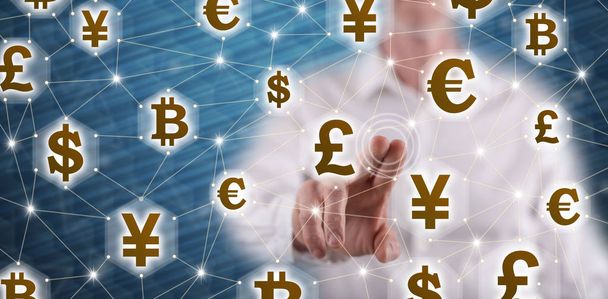 Man touching a currency network concept on a touch screen with his finger - Photo, Image