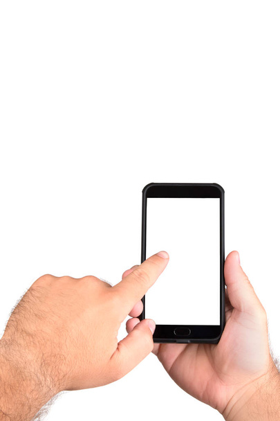 man met telefoon in de hand op witte achtergrond - Foto, afbeelding