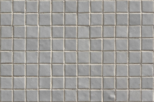 Wall covered in small white tiles texture - Photo, Image