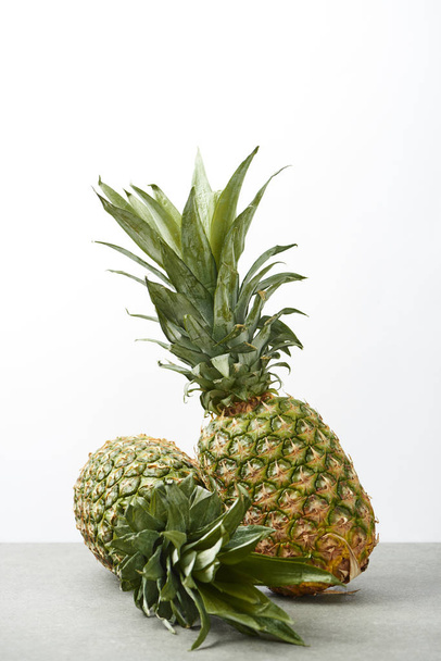 delicious and sweet pineapples isolated on white - 写真・画像