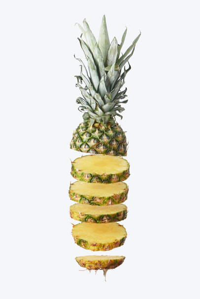 sliced, tasty and organic pineapple isolated on white  - Foto, Imagem