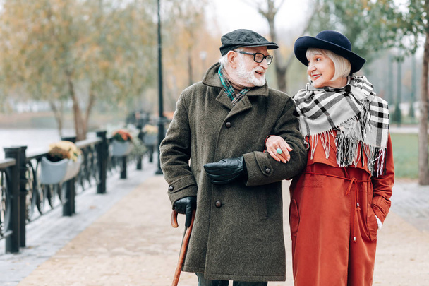 Positive delighted mature people looking at each other - Fotoğraf, Görsel