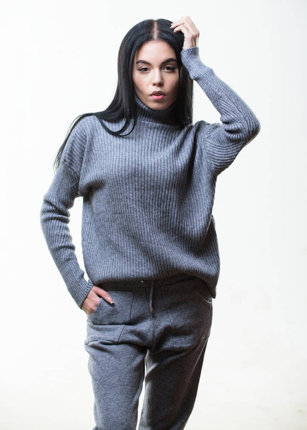 Knitwear concept. Feel warm and comfortable. Woman wear grey textile suit blouse and pants. Warm comfortable clothes. Casual style fashion for every day. Female knitwear. Fashionable knitwear - Foto, Bild