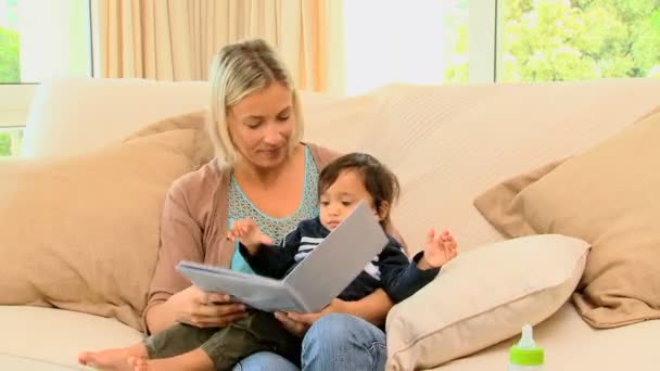 Mother reading to her son - Footage, Video