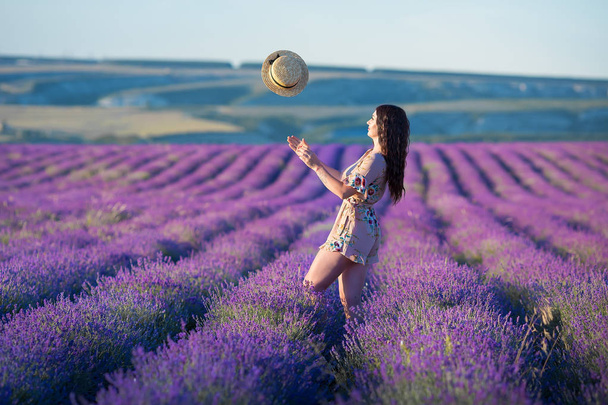 Young magic adorable woman in lavender field on summer day dancing and enjoy life time with woman girl power. - Fotografie, Obrázek