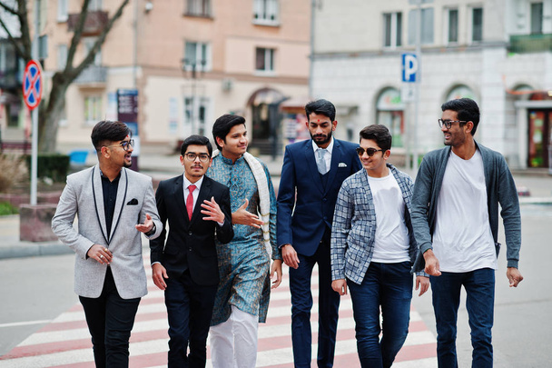 Group of six south asian indian mans in traditional, casual and business wear walking at crosswalk together. - Fotografie, Obrázek