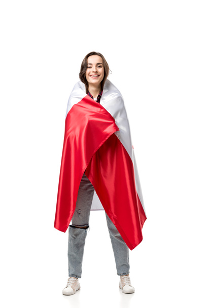 smiling woman covered in canadian flag isolated on white - Φωτογραφία, εικόνα
