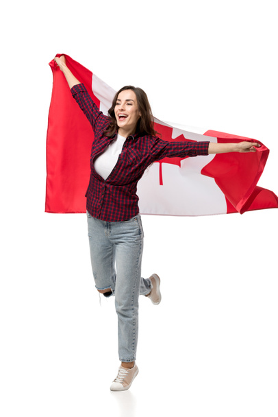 beautiful cheerful woman holding canadian flag isolated on white - Foto, afbeelding