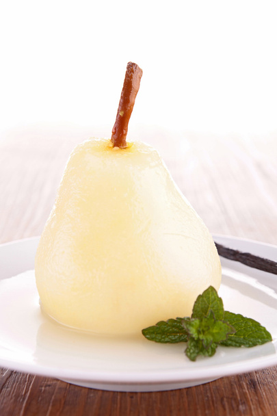 poached pear with syrup - Valokuva, kuva