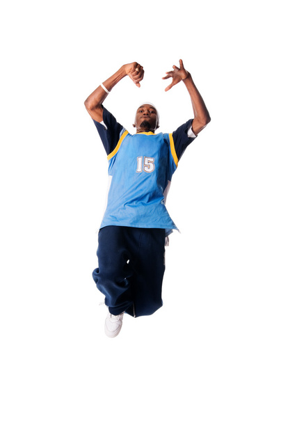 Hip-hop young man making cool move on white back - Foto, immagini