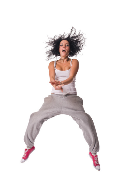 Beautiful fit girl jumping high isolated on whit - Valokuva, kuva