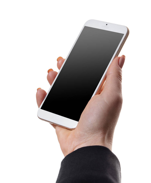 κινητό τηλέφωνο στο γυναικείο χέρι σε λευκό απομονωμένο φόντο - Φωτογραφία, εικόνα